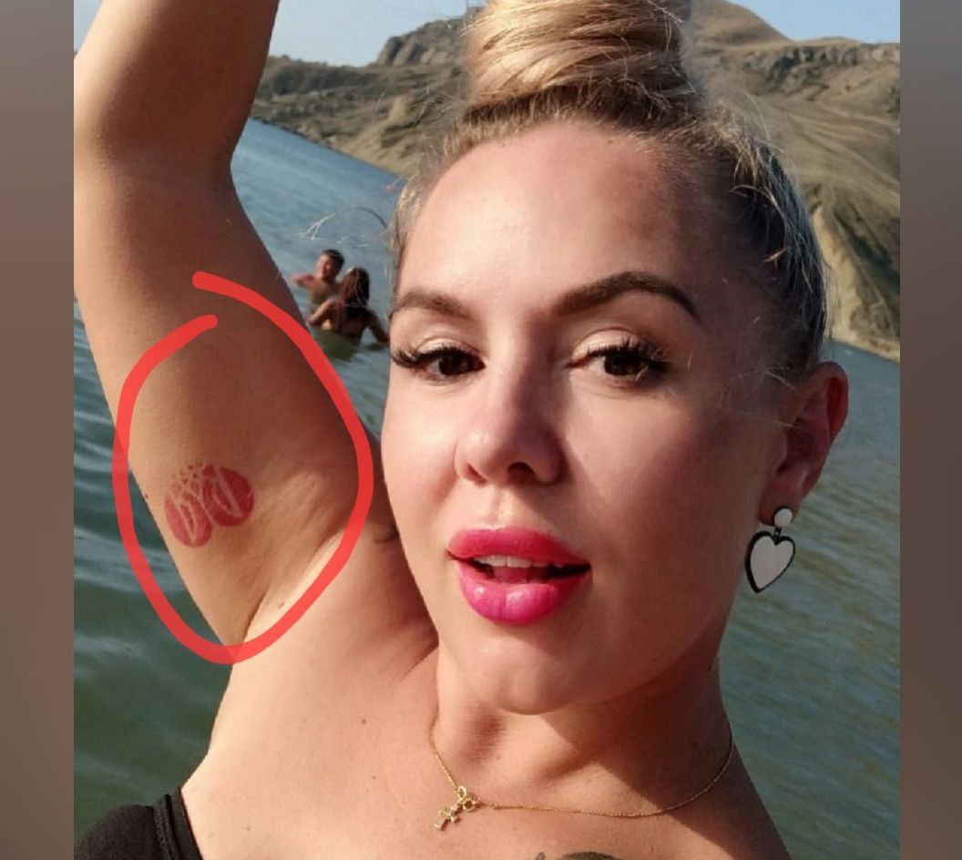 Жительница Крыма на камеру извинились за татуировку с гербом Украины, которую она сделала в 2009 году