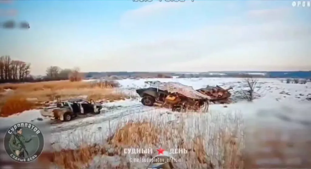 Кадры поражения бронетранспортёра M1117 ВСУ, который пытался эвакуировать другой застрявший и брошенный M1117, также поражённый дроном