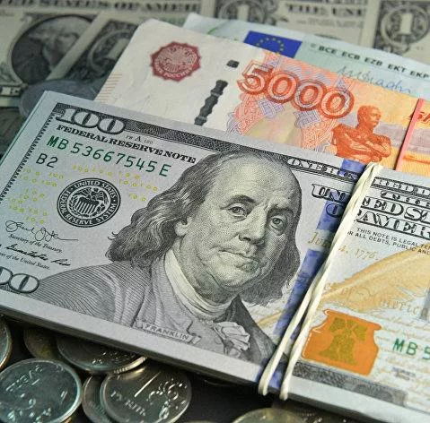 Доллар может вскоре упасть до 60 рублей