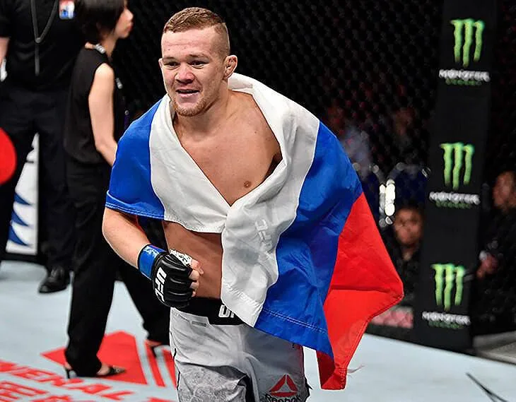 Русский боец Петр Ян завоевал чемпионский титул UFC в легчайшем весе