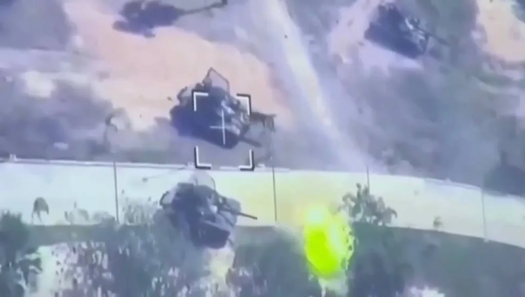 Предположительно, украинские «Оплот-Т» тайской армии ведут огонь прямой наводкой по зданию таможенного и акцизного управления в населённом пункте Боеунг Троркуон (Тракун)