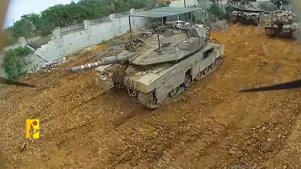 Поражение 2 ТБТР Namer в кормовые люки, танка Merkava Mk.4M и БТР M113 ударами FPV-дронов "Хезболлы" на парадных стоянках техники ЦАХАЛ в Ливане