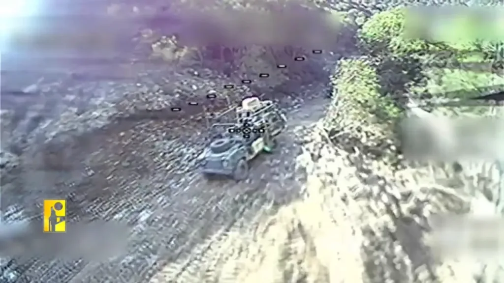 Удары FPV-дронов "Хезболлы" по израильским машинам связи/РЭР на базе внедорожника Land Rover Defender и бронеавтомобиля HMMWV